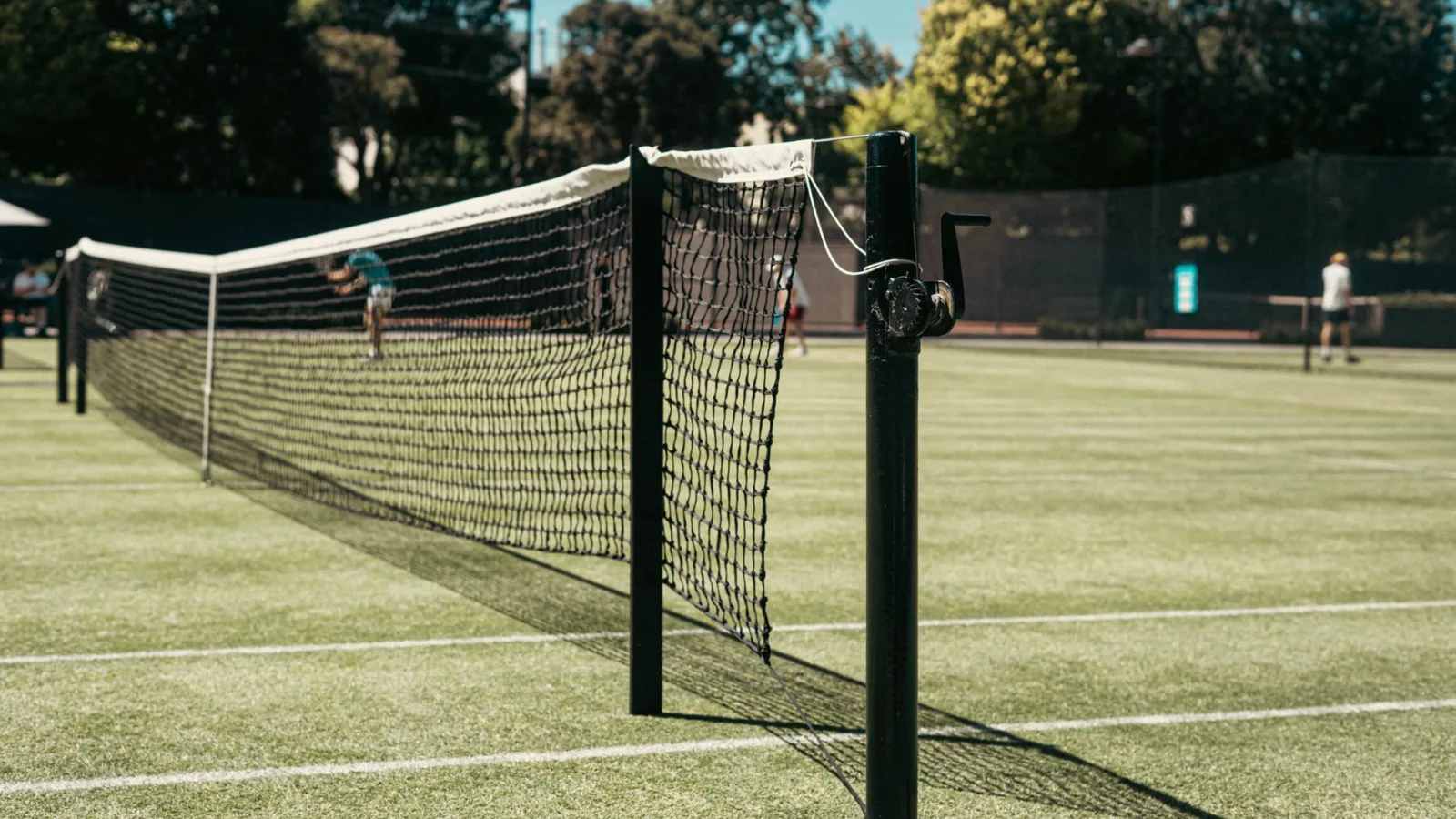 Detailed view of a tennis net on a sunny day at Toorak tennis court in Australia.