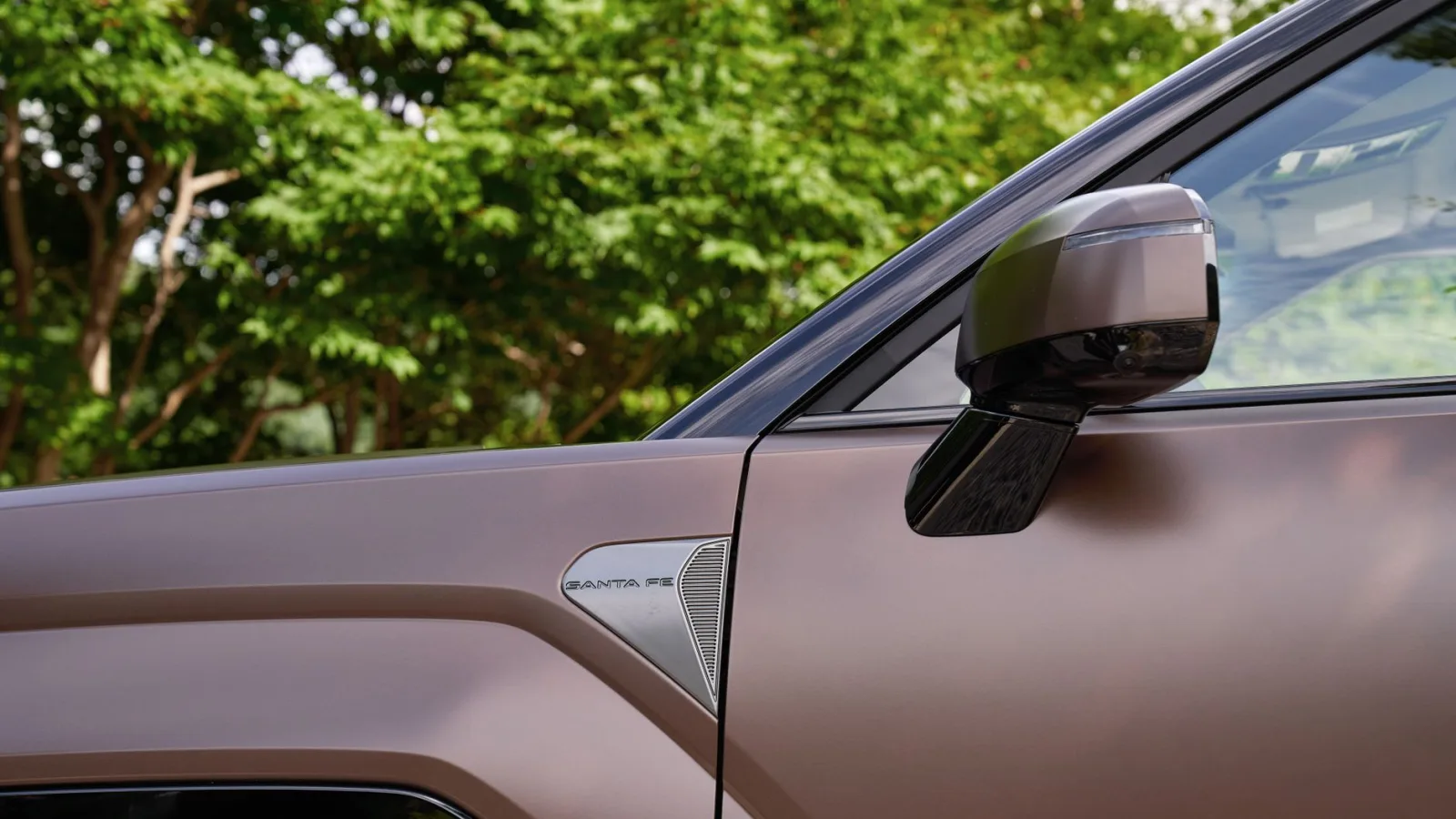 Facelifted Hyundai Santa Fe SUV on a road